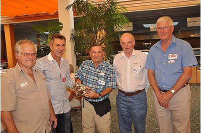 Rob GM3YTS presents George AA7JV and Tomi HA7RY of the TX3A Chesterfields DX-pedition with a GM-DX Quaich trophy.